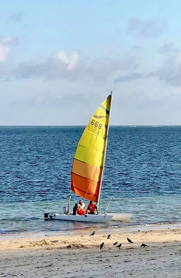 Catamaran sailing off Bamburi Beach in front of Kenya Bay Beach Hotel
